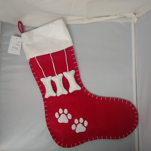 Front of stocking showing dog bones and paws