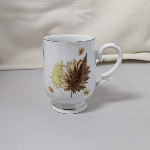 Left side of Mug showing flower pattern